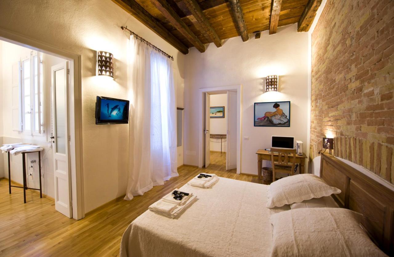 Castelletto Suites Cagliari Kamer foto